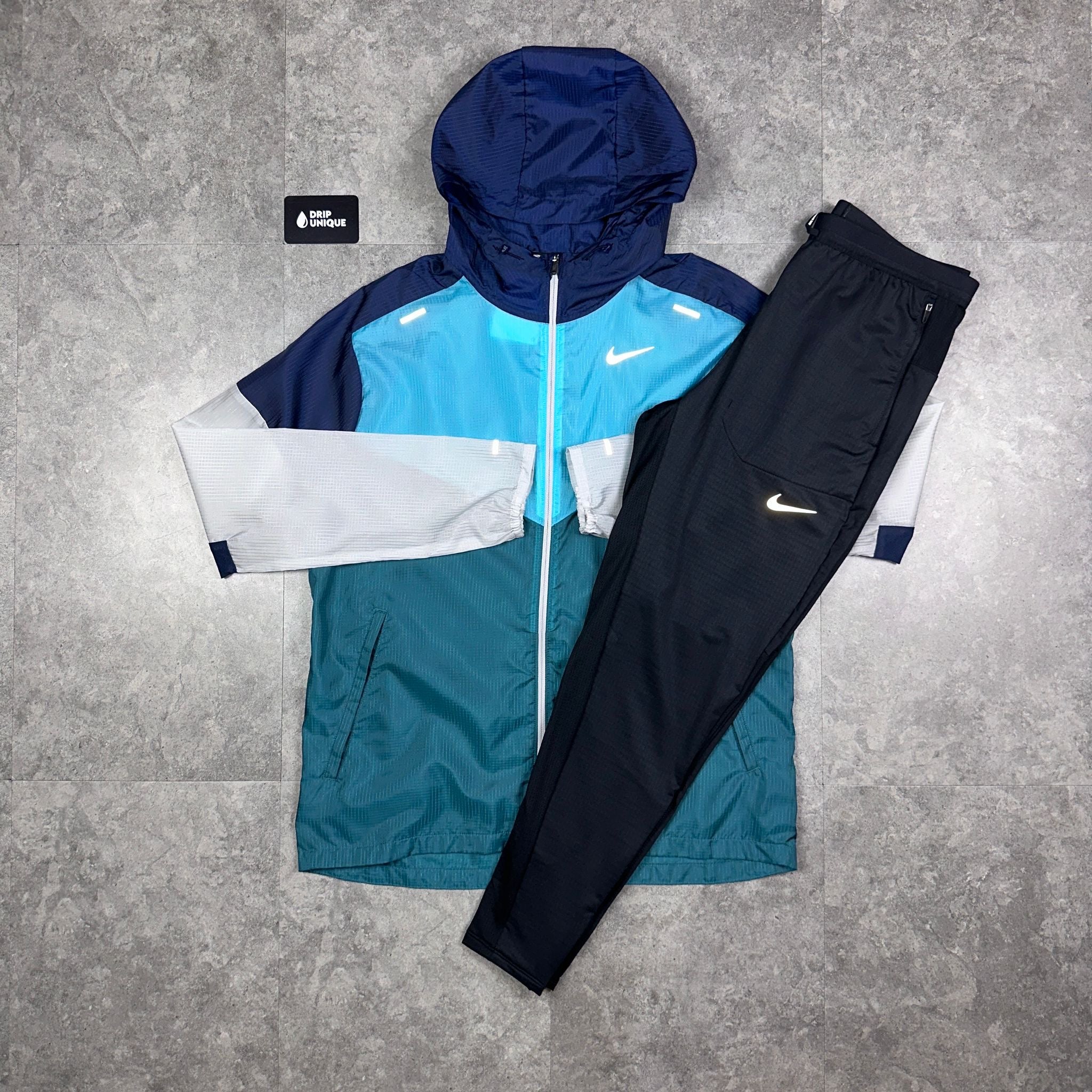 black and blue nike windrunner