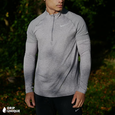 Men's Nike Therma 1/4 Zip in a Grey colourway. Sportswear and activewear at dripuniqueuk