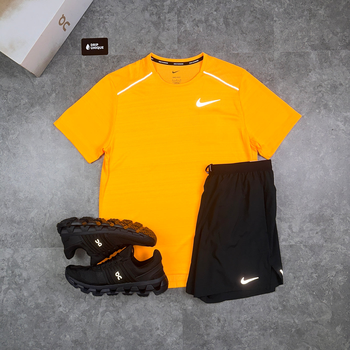 Men's Nike Miler T-Shirt Laser Orange, paired with the black Nike flex stride shorts and the on running cloudswift 3 trainers, dripuniqueuk