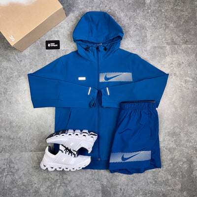 Men's Nike Flash Unlimited Repel Windrunner Jacket Blue, combined with the Flash Unlimited Repel Shorts in a blue colourway to complete the set, paired with the white on running cloudswift 3 trainers, dripuniqueuk