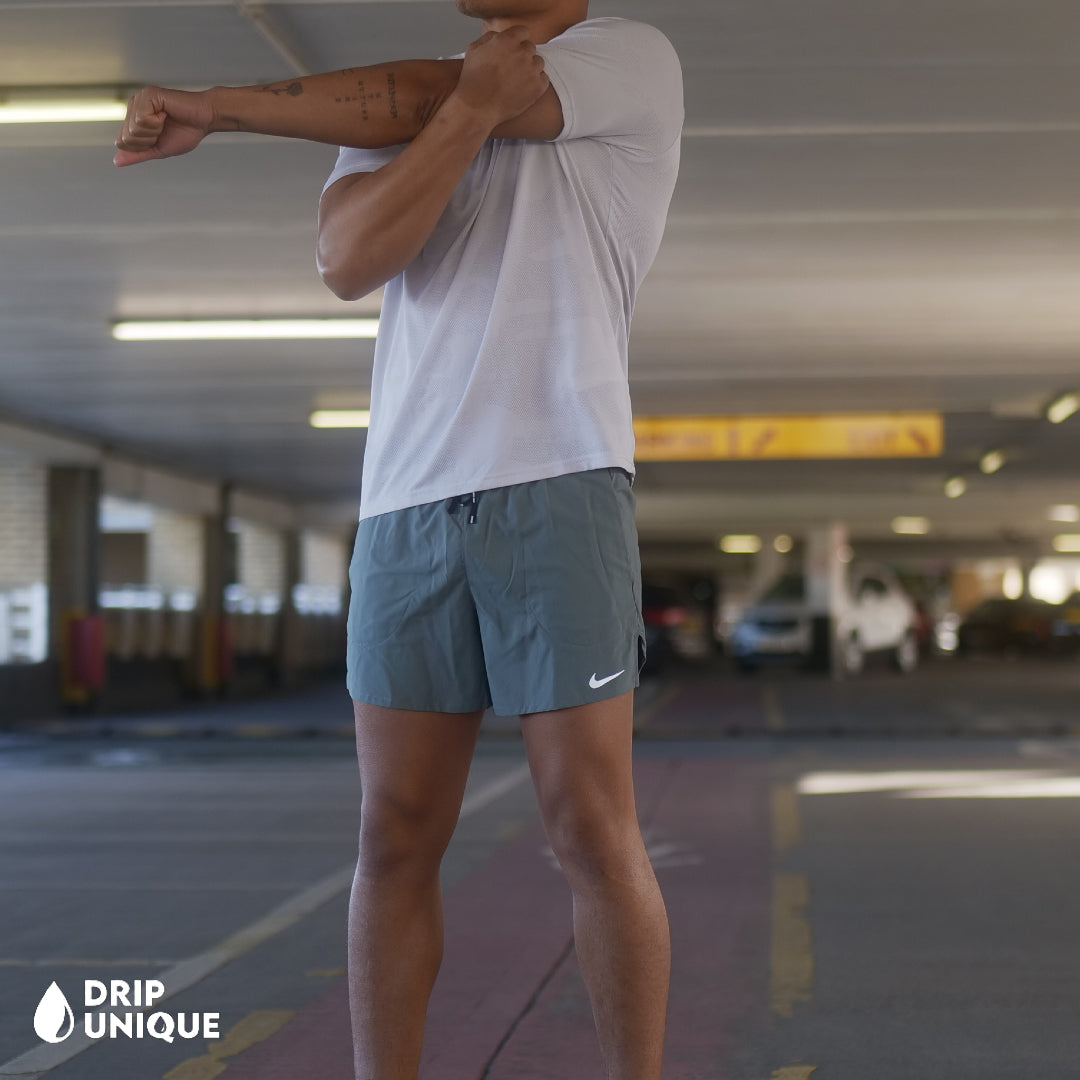 nike flex stride 5 inch grey