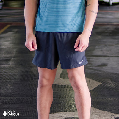 Men's Nike Miler T-Shirt Mineral Teal & Black Flex Stride Shorts Set, Showcasing the design of the Nike Miler t-shirt in a mineral teal colourway, paired with the black nike flex stride shorts to complete the set, worn by our model, dripuniqueuk