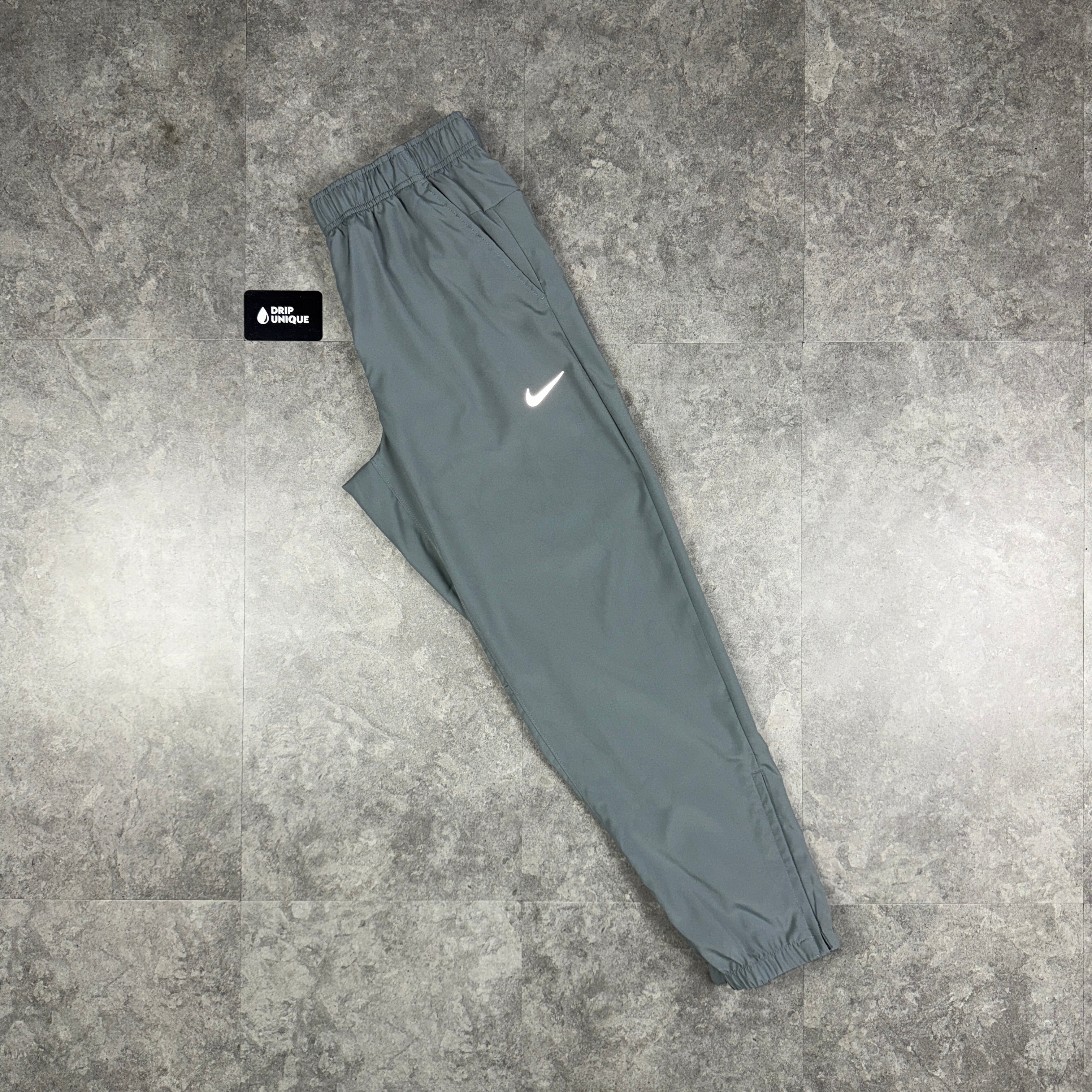 nike solid men's grey track pants