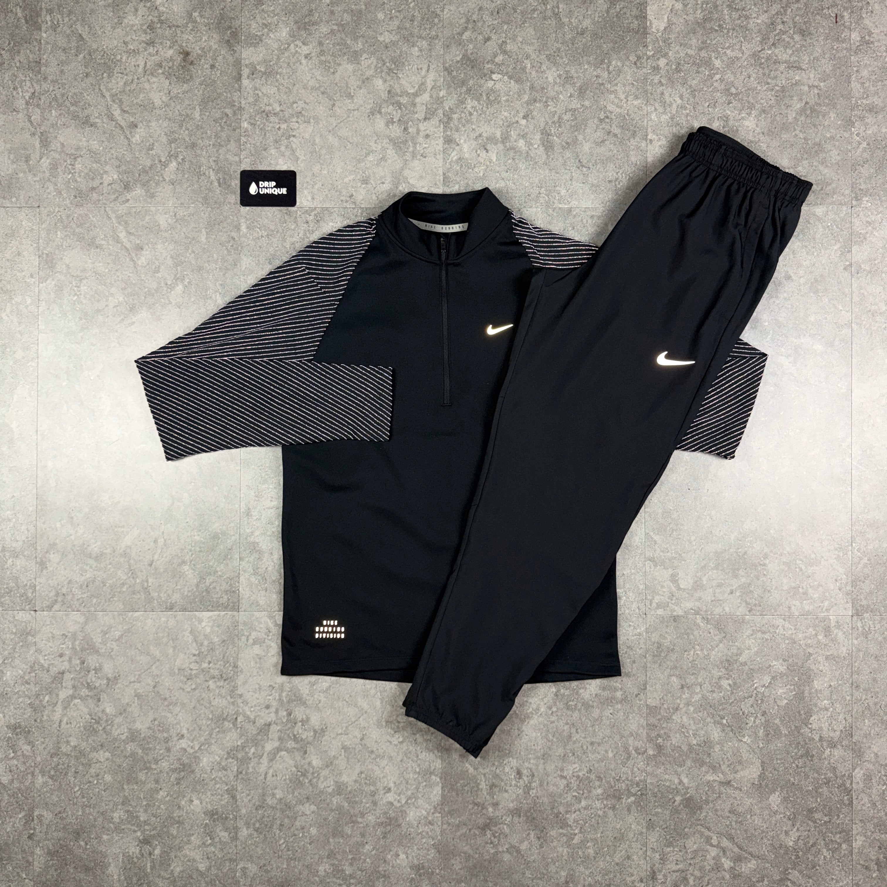 nike quarter zip tracksuit