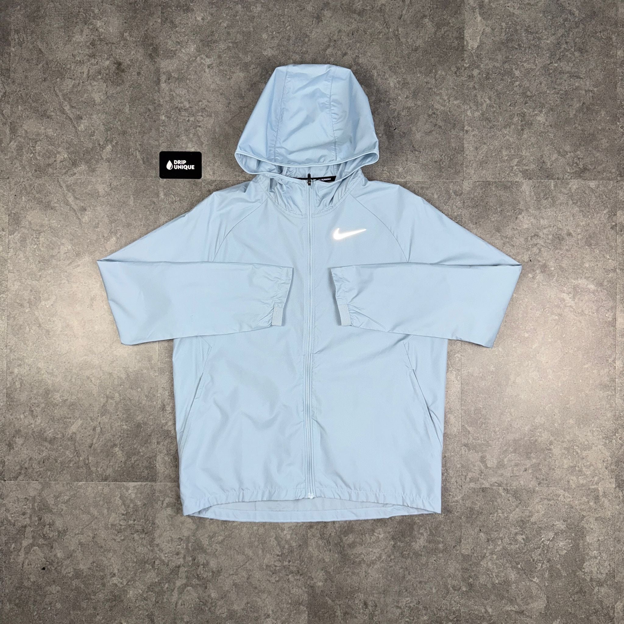 nike essential running jacket blue