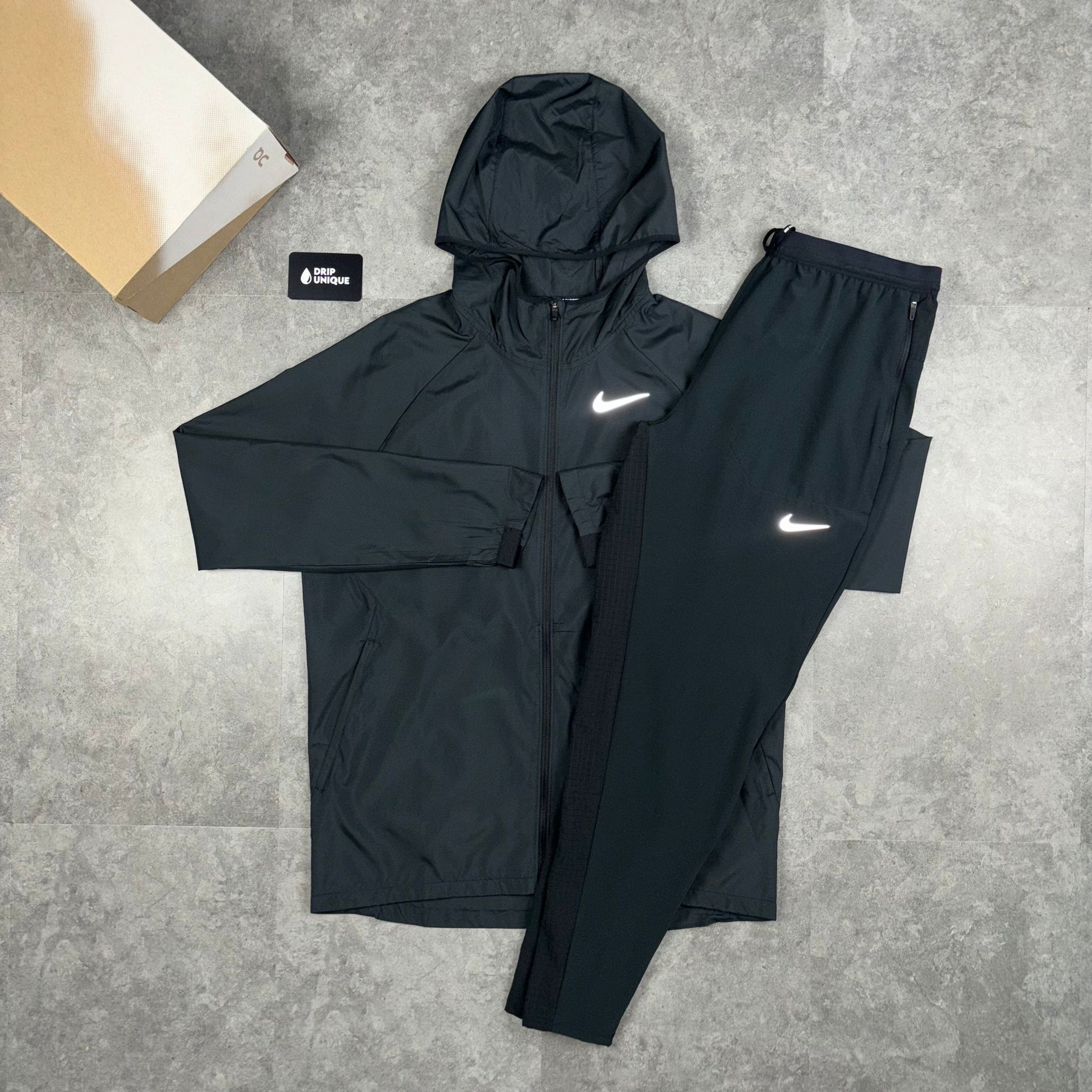 Nike essential jacket black discount