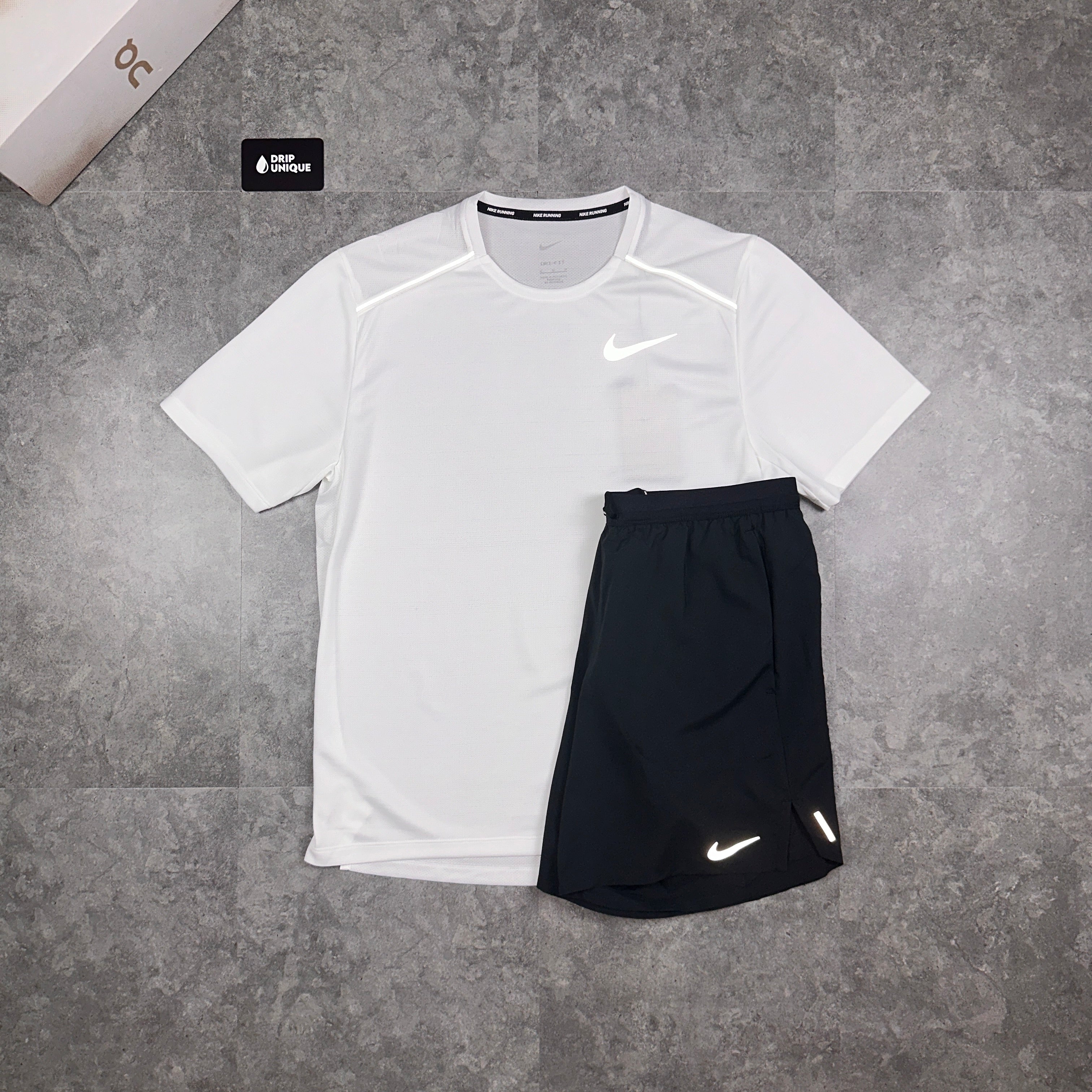 mens white and black nike shirt