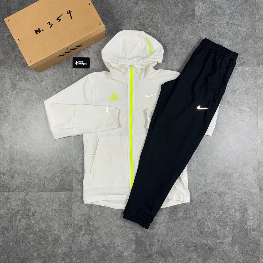 Nike Repel “Just Do It” Windrunner Jacket White & Black Nike Challenger Pants Set, Nike Sets, dripuniqueuk