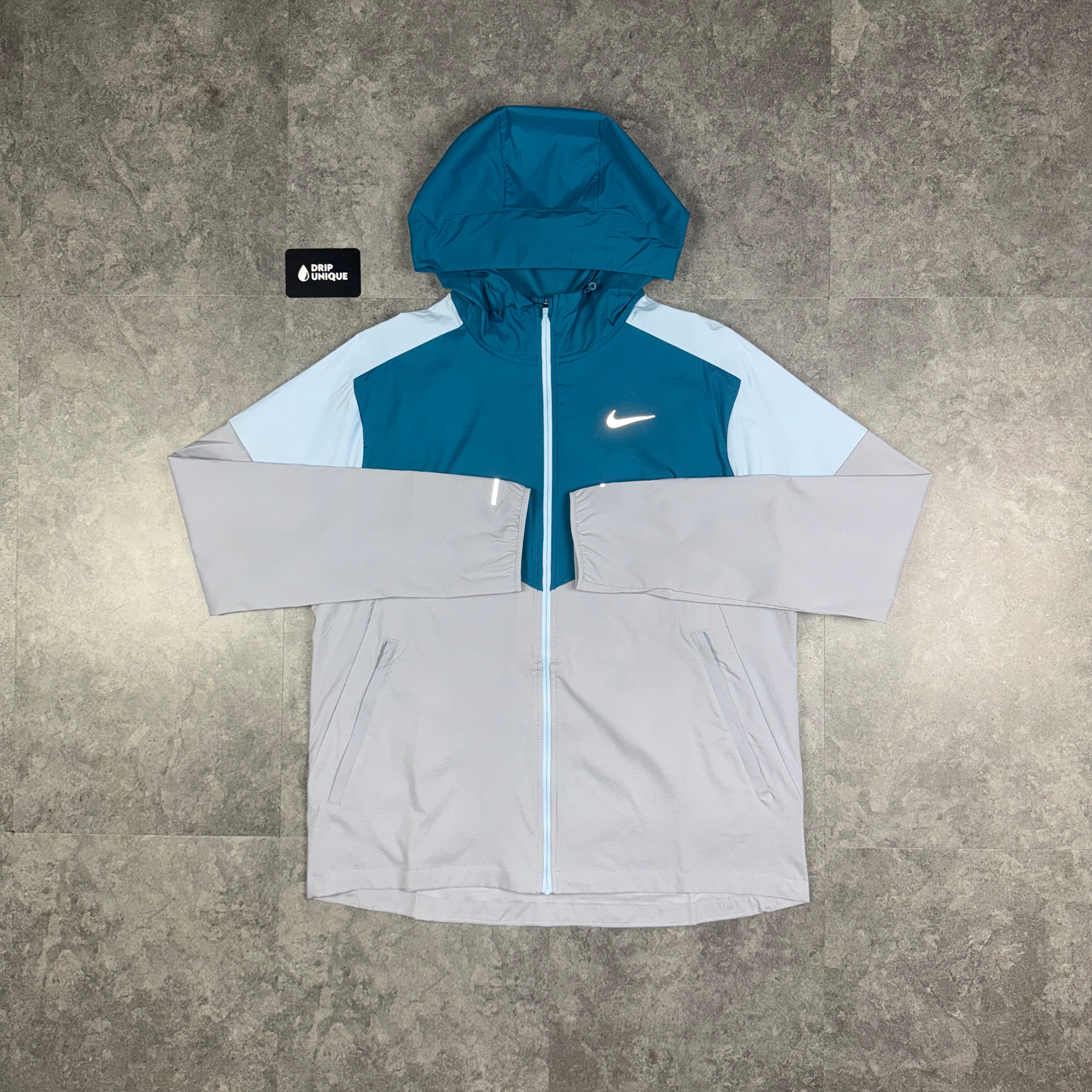 green blue and white nike windbreaker