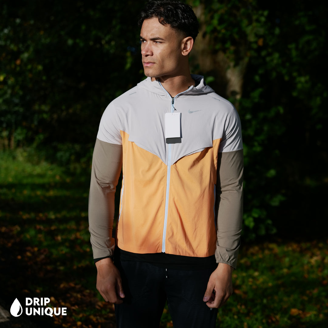 Nike UV Windrunner Jacket Orange Cream Black Nike Phenom Pants Set