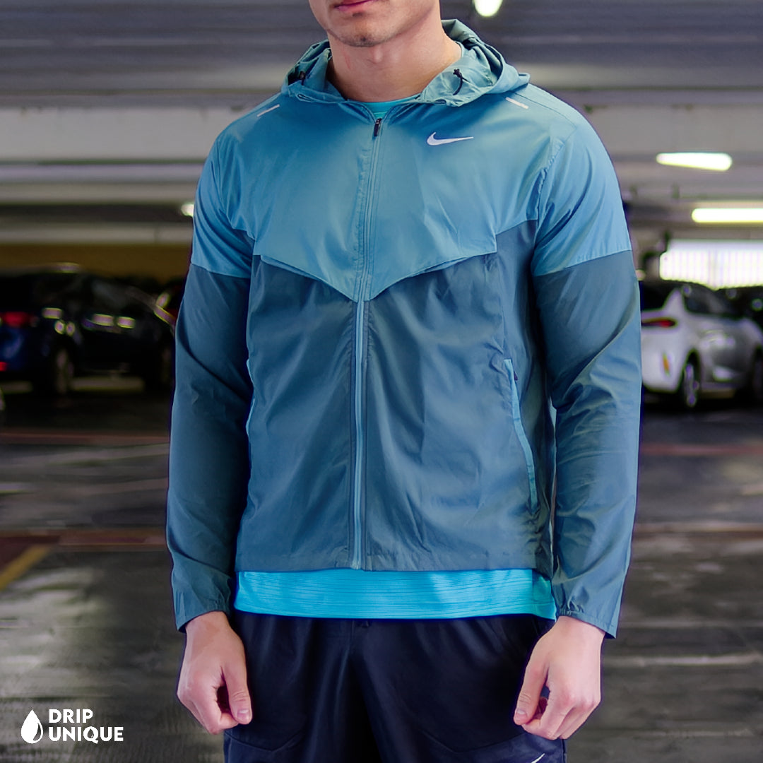 Men's Nike UV Windrunner Jacket in a Teal Colorway, up close, showing the colourway and design, dripuniqueuk