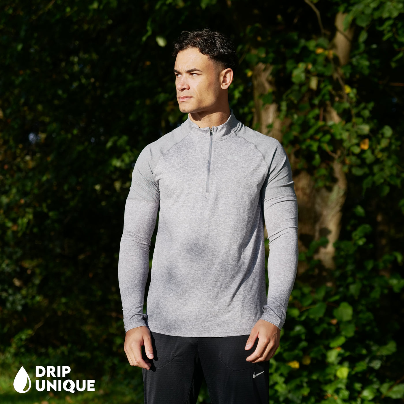 Men's Nike Therma 1/4 Zip Top in a Grey colourway showing the front design, dripuniqueuk