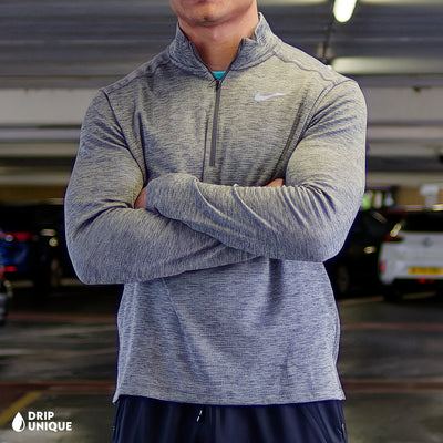 Men's Nike Pacer 1/4 Zip Top in Grey, showcasing the front design, paired with the nike elite phenom pants to complete the look, dripuniqueuk