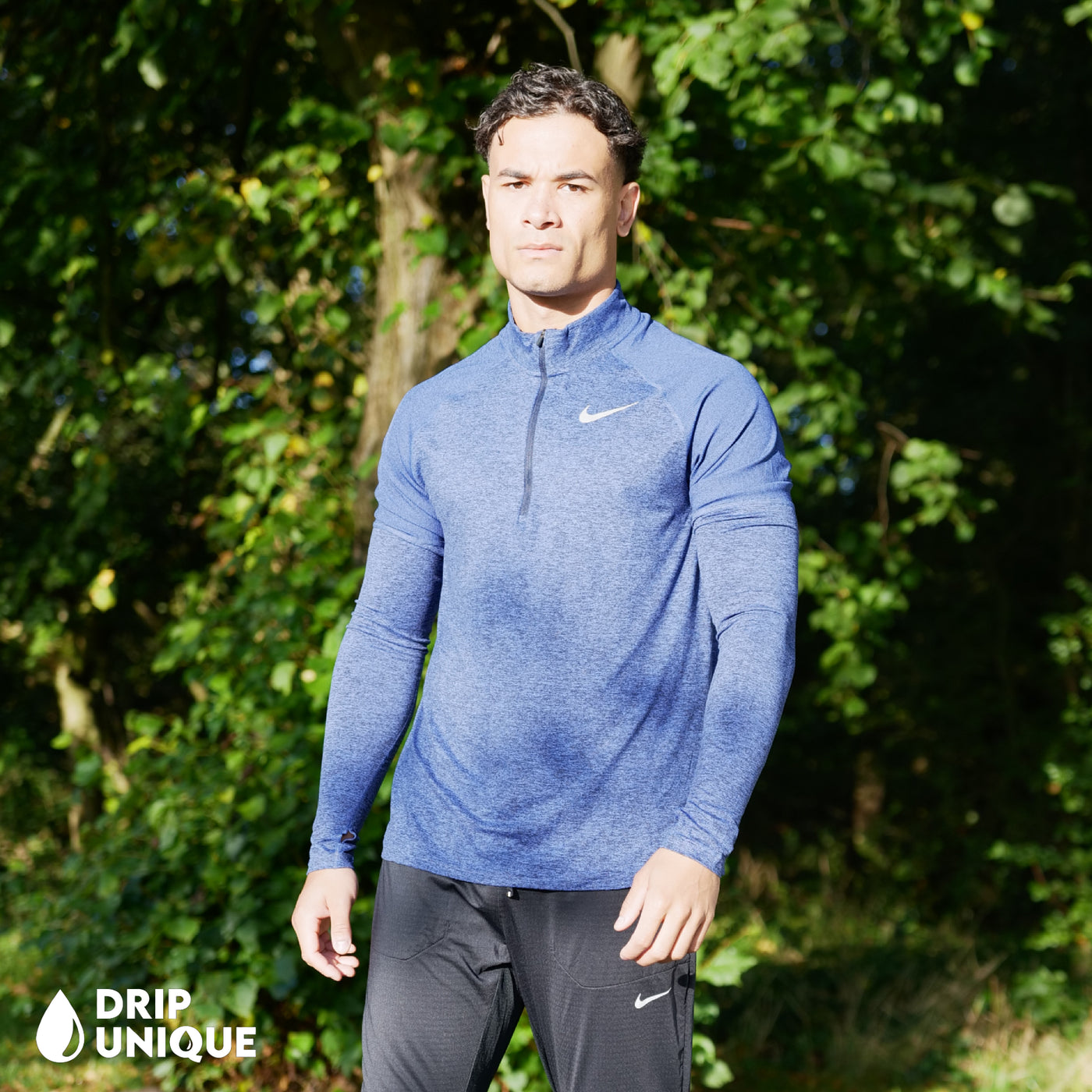 Men's Nike Therma 1/4 Zip Top in a Royal Blue colourway showing the front design worn by our model, dripuniqueuk