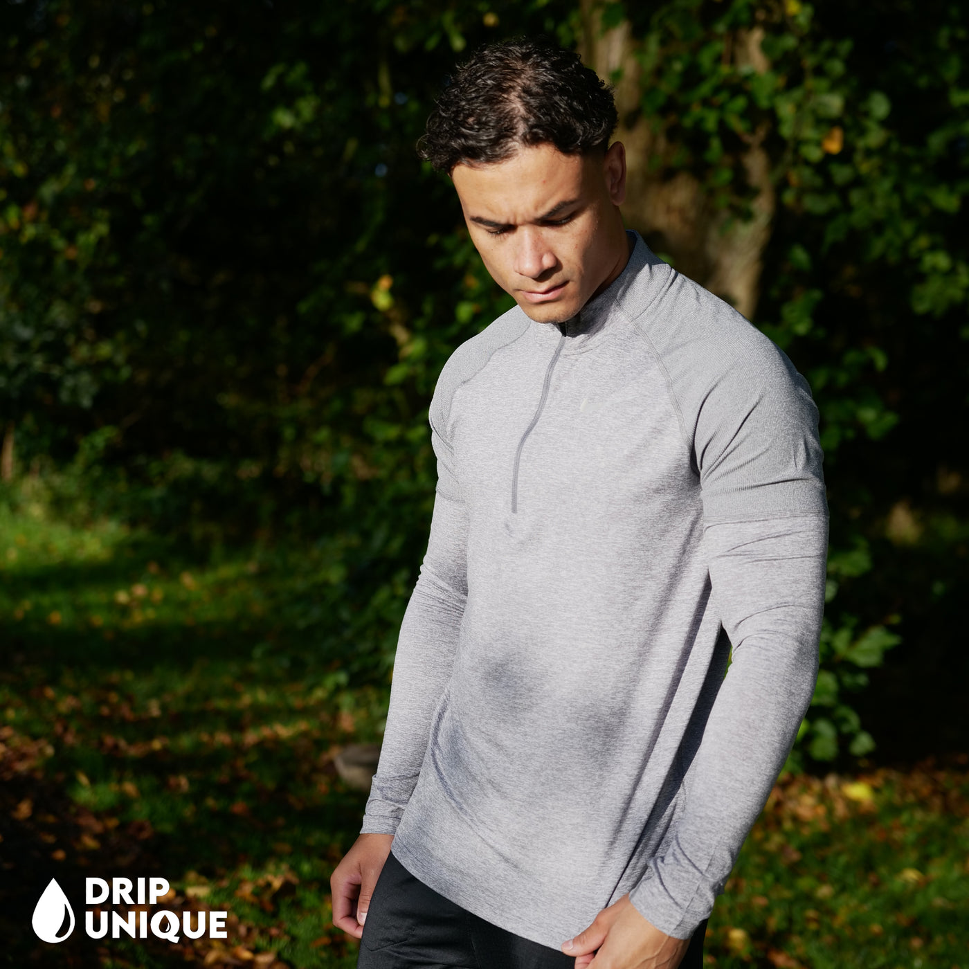 Men's Nike Therma 1/4 Zip Top in a Grey colourway showing the side design, dripuniqueuk