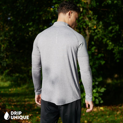 Men's Nike Therma 1/4 Zip Top in a Grey colourway showing the back design, dripuniqueuk